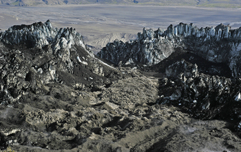 View looking down the volcano's flank; the lower part of the lava flow has a 